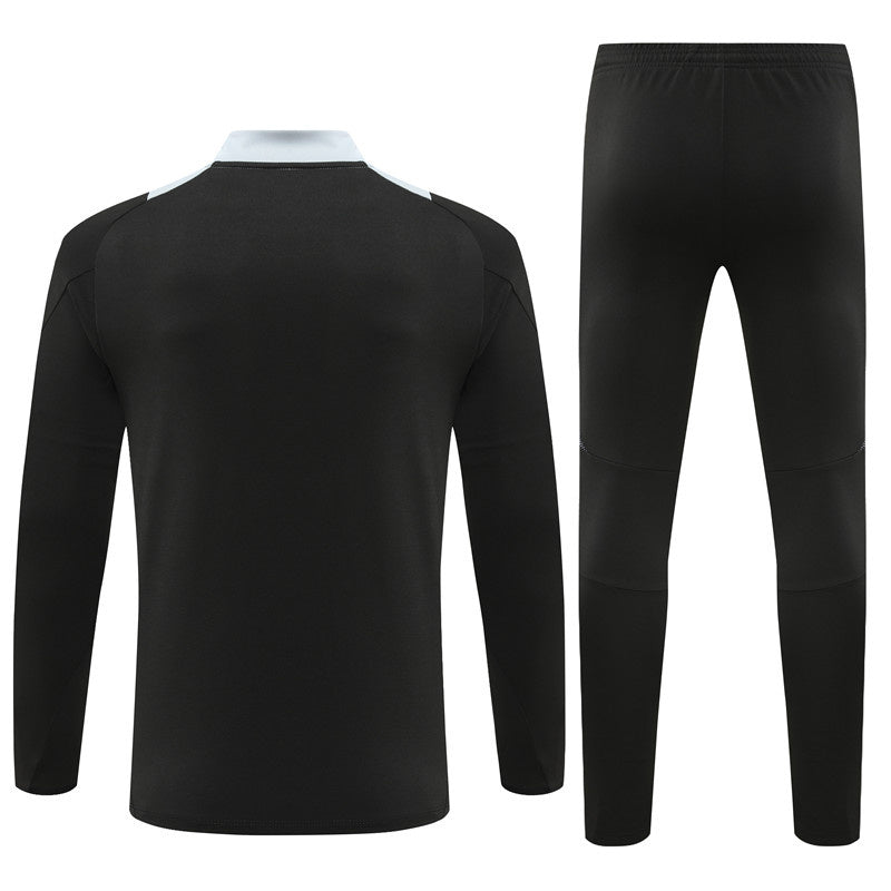 CONJUNTO LARGO MANCHESTER UNITED ENTRENAMIENTO 24/25 HOMBRE